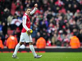 Van Persie adorava o treinador francês. AFP