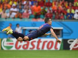 Van Persie's header was shortlisted for the FIFA Puskas Award. AFP
