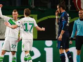 Schürrle y Arnold celebran el tanto del segundo en el Wolfsburgo-Real Madrid de cuartos de Champions. UEFA/AFP