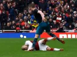 Stephens was shown red for shoving Wilshere. Twitter/ArsenalTerje