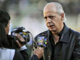 The president of the Bolivian Football Federation and treasurer of the South American Football Confederation (Conmebol), Carlos Chavez, speaks to the press in La Paz, Bolivia on September 3, 2014.