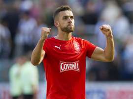 Tom Smith celebra un gol anotado en un partido con el Huddersfield Town. HTAFC