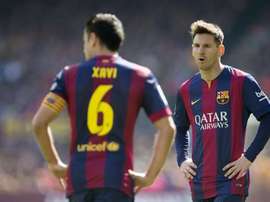 Xavi encense Messi. AFP