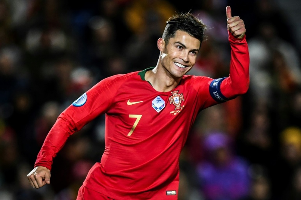 Ronaldo hat-trick fires Portugal to brink of Euro 2020 qualification. AFP