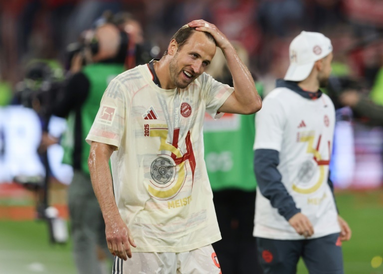 'Weight off my shoulders': Kane toasts breakthrough title