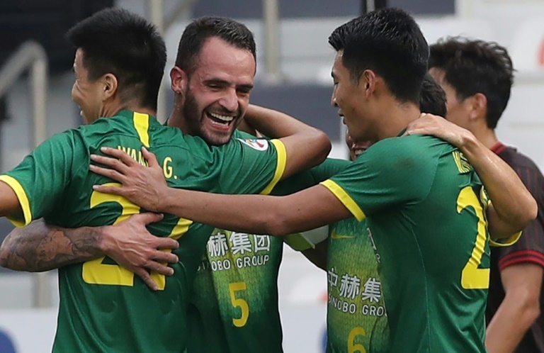 A Lan Strike Puts Beijing Guoan In Acl Quarters