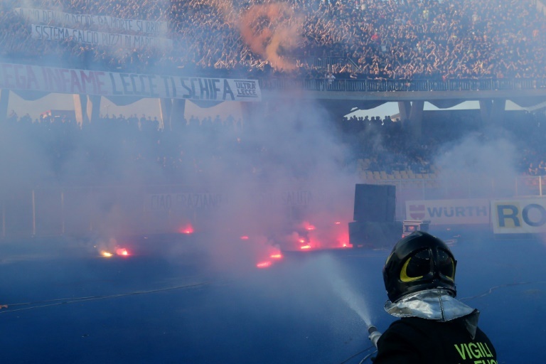 Serie A leaders Napoli go six clear after win at fiery Lecce