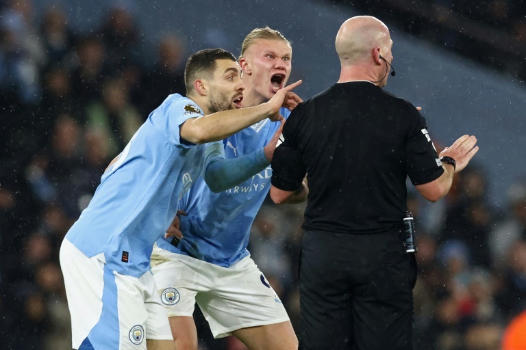 Man City charged by FA over players' behaviour against Tottenham